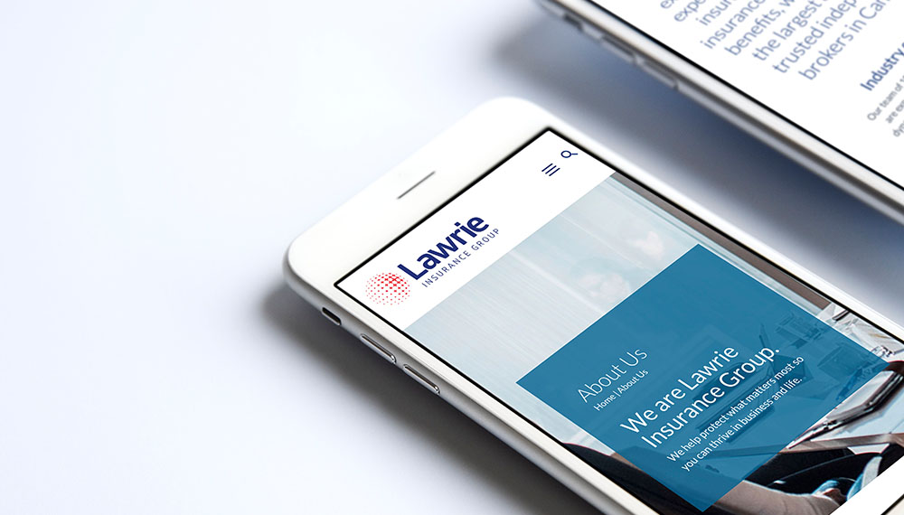 Lawrie Insurance Group website redesign shown on a laptop